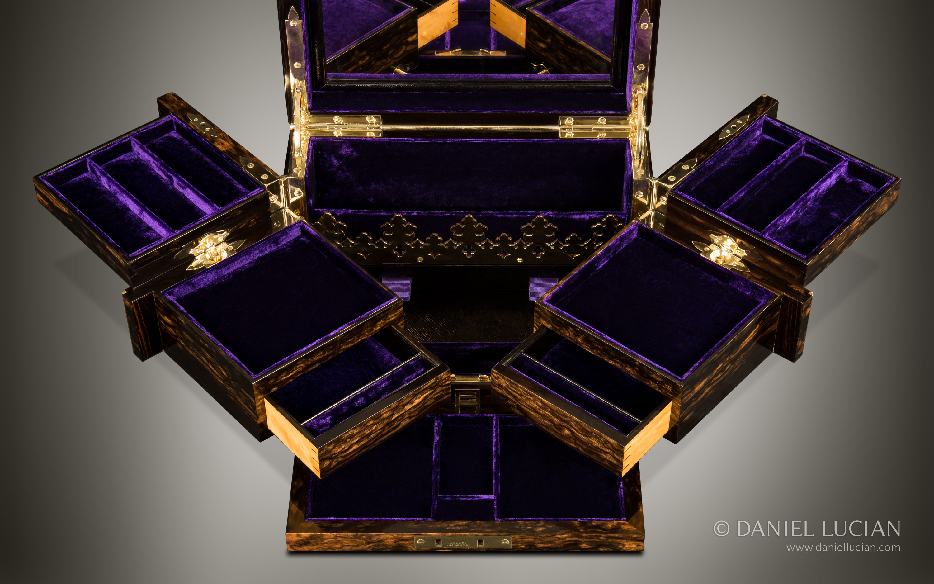 Asprey Antique Jewellery Box in Coromandel with Betjemann Patent Mechanism.
