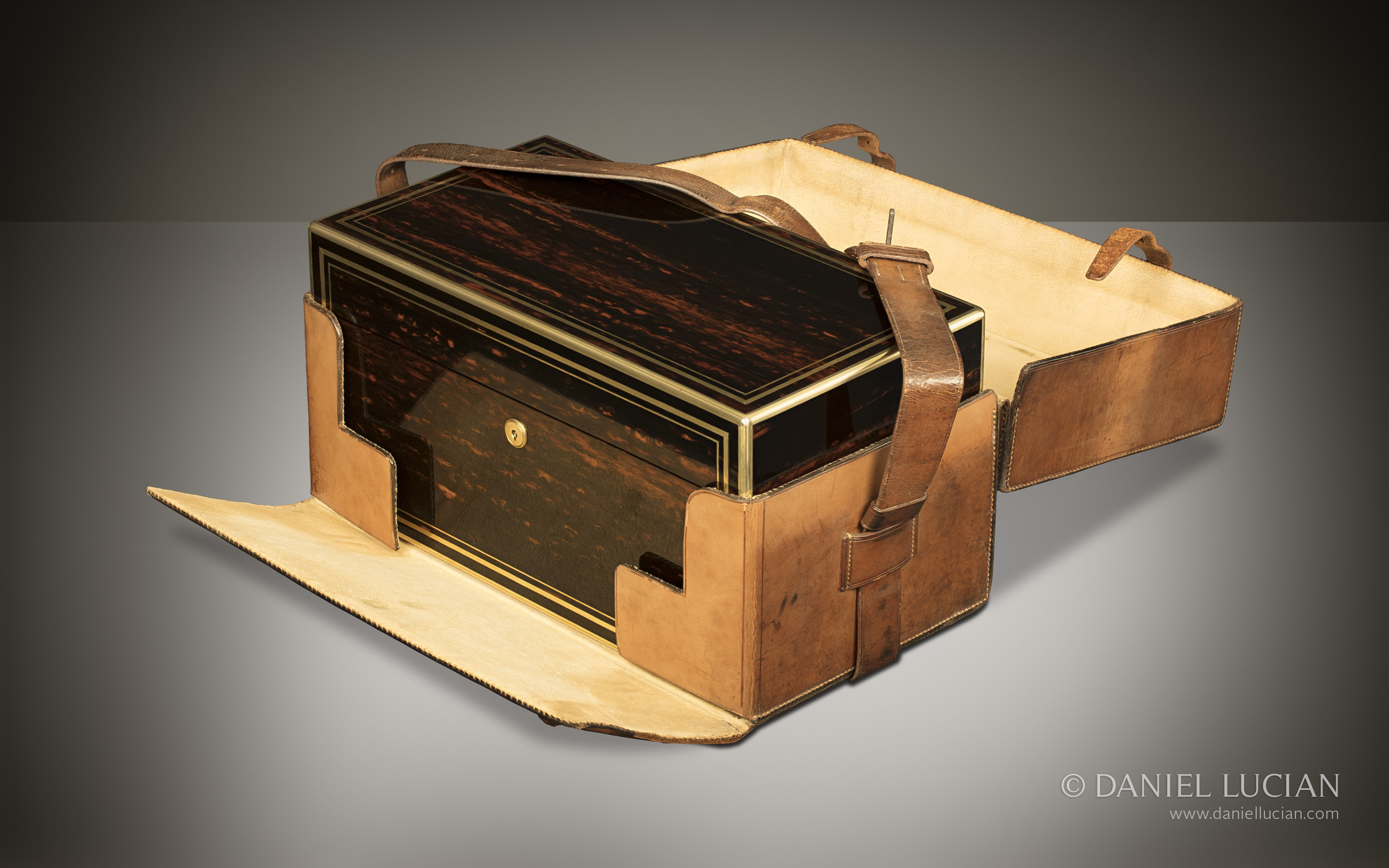 Leather outer case for an antique dressing case in coromandel, by Jenner & Knewstub, belonging to the Lady Mayoress of London.