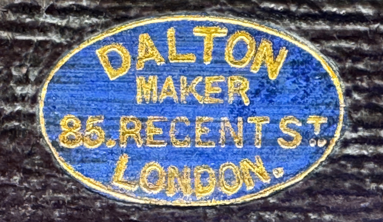 Gold-tooled maker's label belonging to Thomas Dalton.