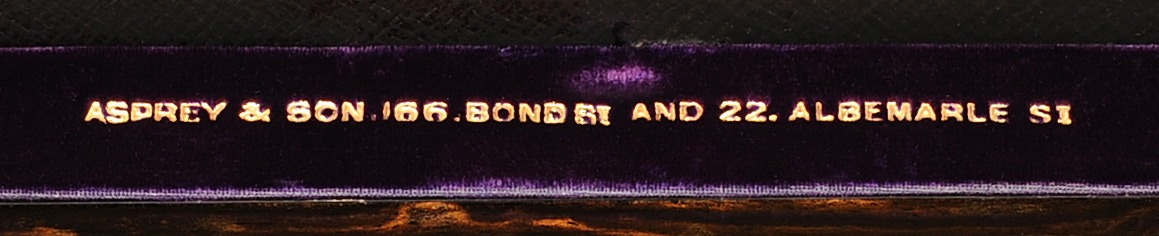 ‘Asprey & Son. 166. Bond St and 22. Albemarle St’ manufacturer’s mark gold tooled into velvet.