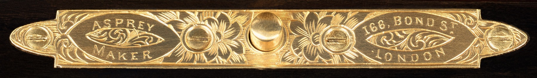 Asprey engraved brass manufacturer’s plate from an antique jewellery box in calamander.
