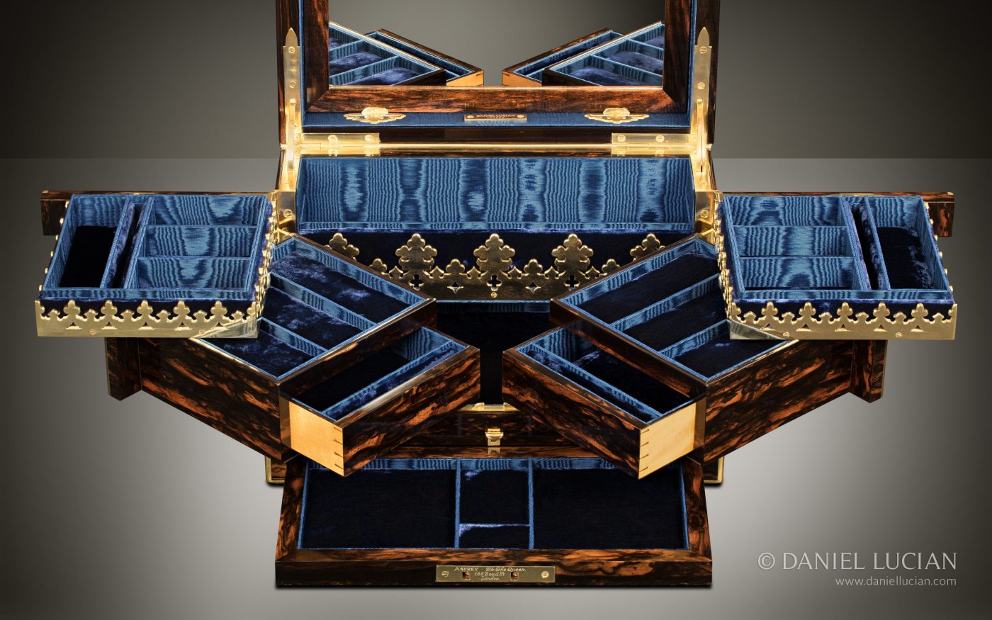 Open antique box showing trays and construction