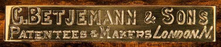 George Betjemann & Sons engraved brass manufacturer’s plate from an antique jewellery box in coromandel with Betjemann Patent mechanism.