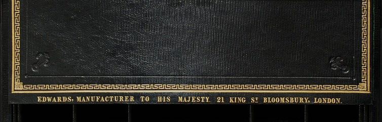 ‘Edwards, Manufacturer to His Majesty, 21 King St, Bloomsbury, London’ gold tooled onto leather.