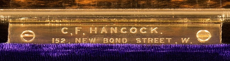 C. F. Hancock engraved brass retailer’s plate.