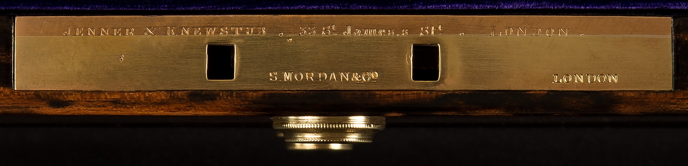 The lock plate is engraved with the manufacturer’s and retailer’s mark of, ‘Jenner & Knewstub – 33 St James’s St – London. Additionally, the lock is engraved with the locksmith’s manufacturer’s mark of ‘S. Mordan & Co – London’.