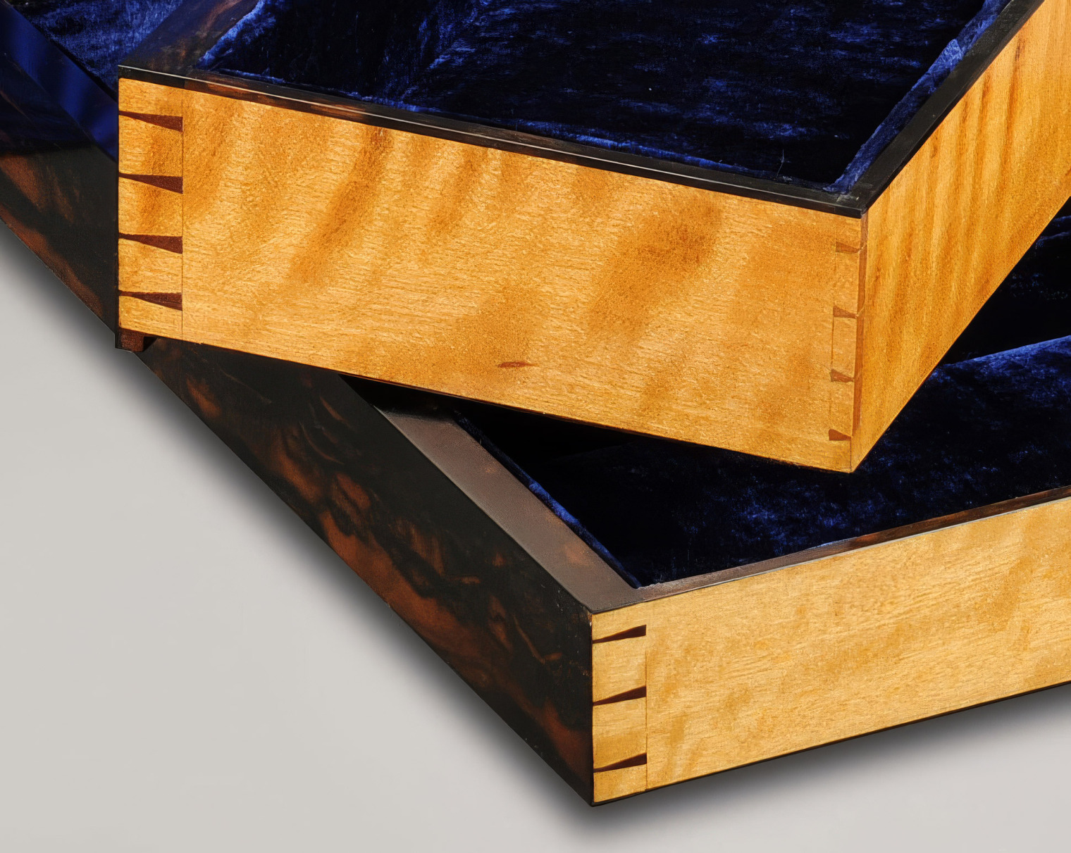 Antique dovetail-joined satinwood drawers.
