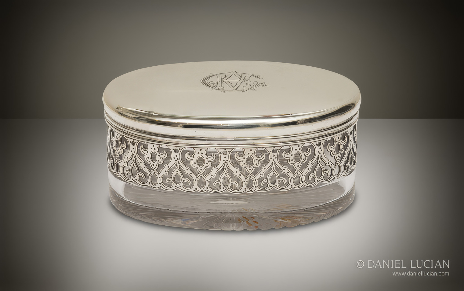 Cut-glass soap jar with pierced decorative silverwork and an engraved monogrammed lid, from a Jenner & Knewstub dressing case.